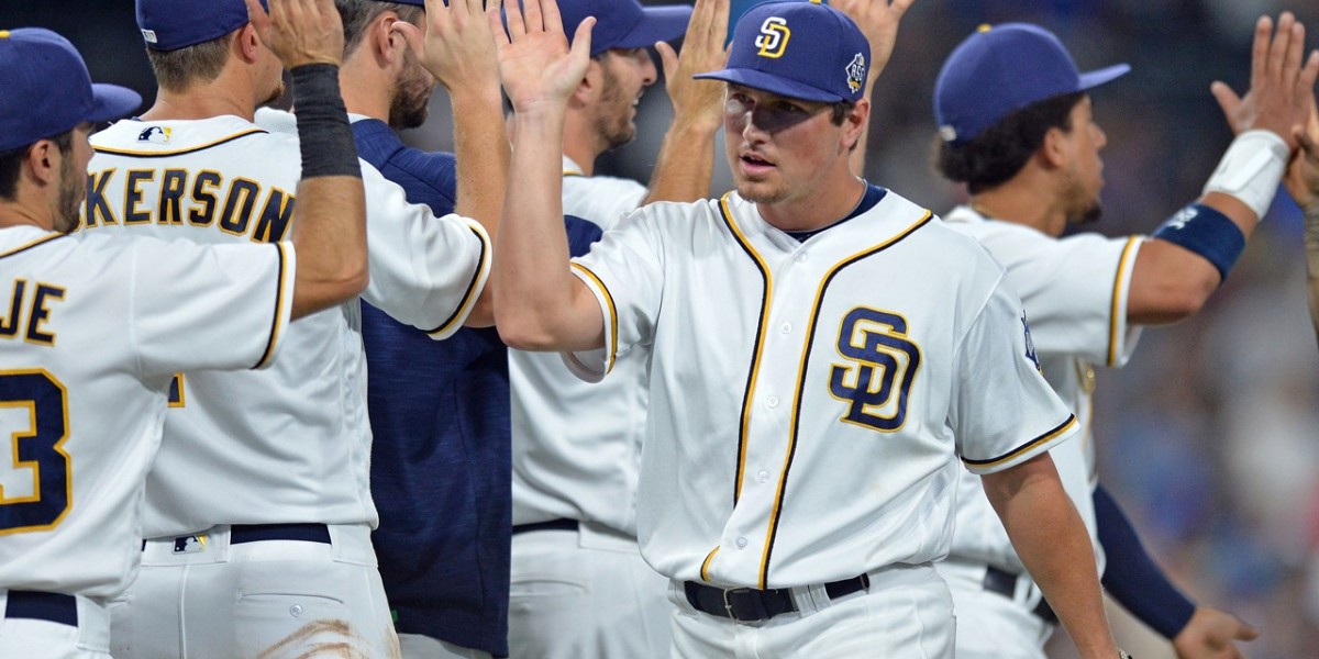 Padres rally for 4 in 9th, beat Dodgers 4-2 to avoid move